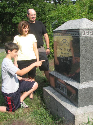 family visiting Bent gravestone